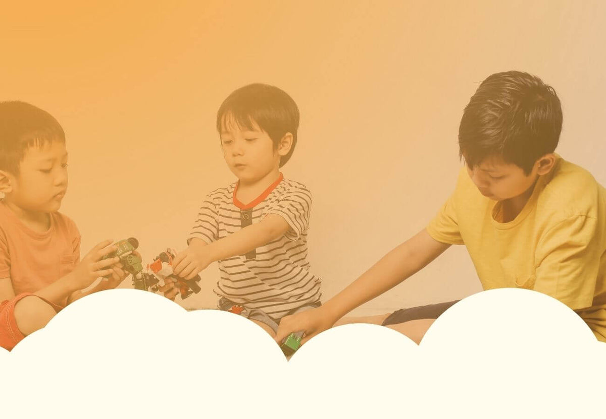 Children playing together in a creative environment, introducing fun and imagination while focusing on introducing play.